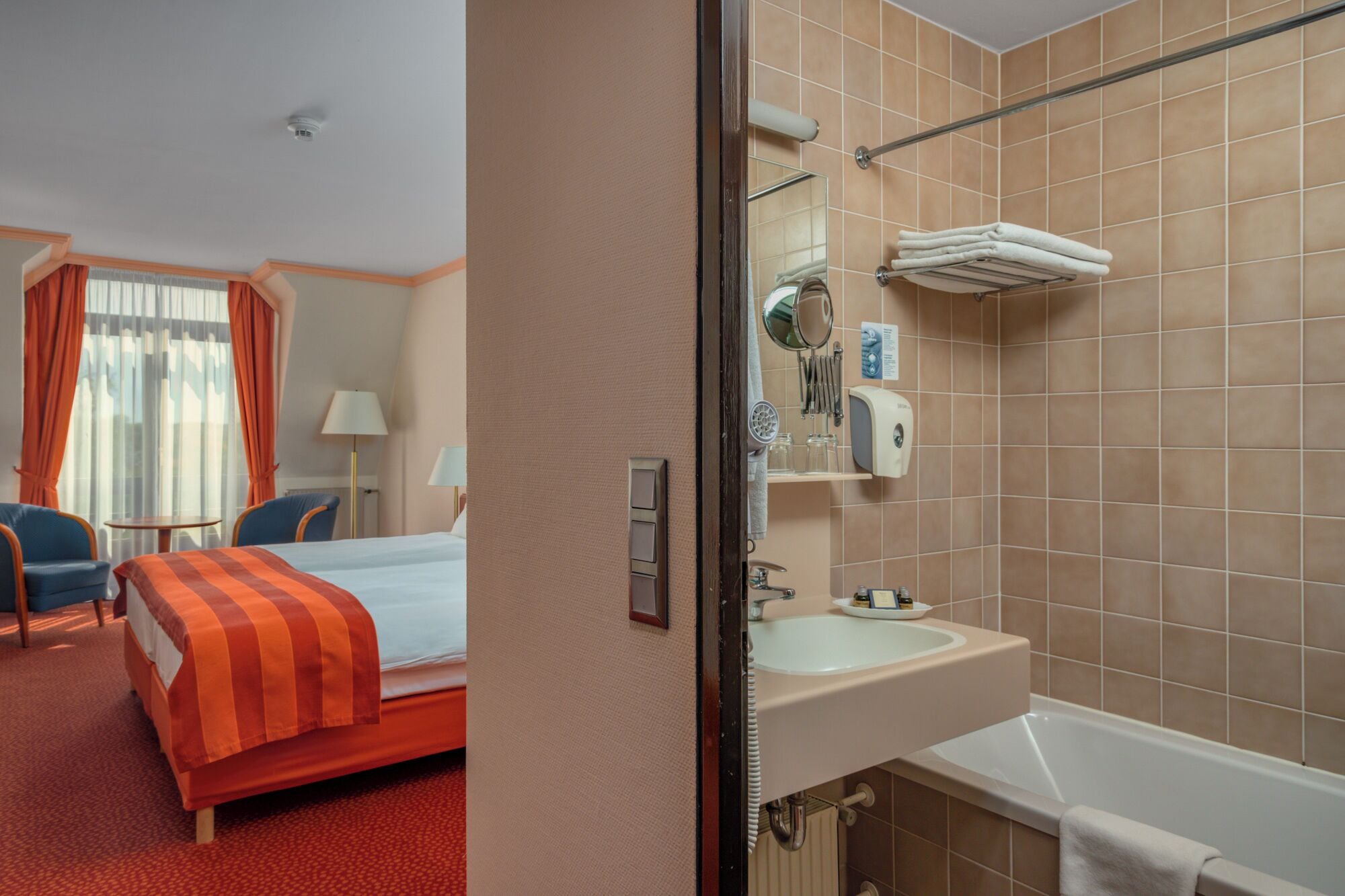 bathtub, free toiletries, hair dryer, dressing gowns