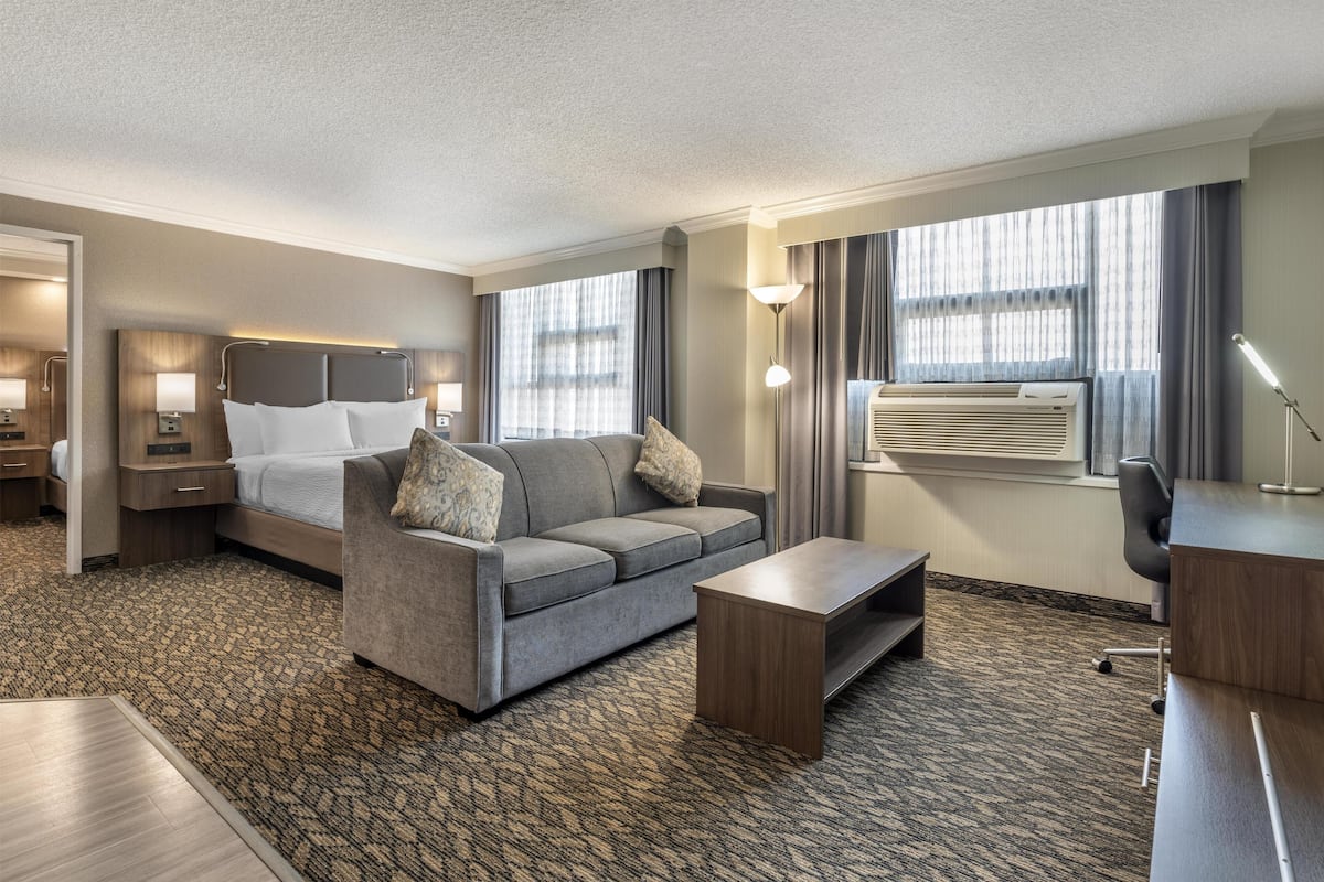 Suite, Multiple Beds, Non Smoking, Kitchen (Third bed is a Sofabed, Full Kitchen) | In-room safe, desk, laptop workspace, iron/ironing board