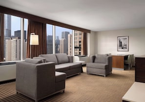 Suite, 1 King Bed, Non Smoking, Refrigerator & Microwave | Living area | 37-inch LCD TV with cable channels, Smart TV