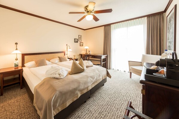 Hypo-allergenic bedding, in-room safe, desk, laptop workspace