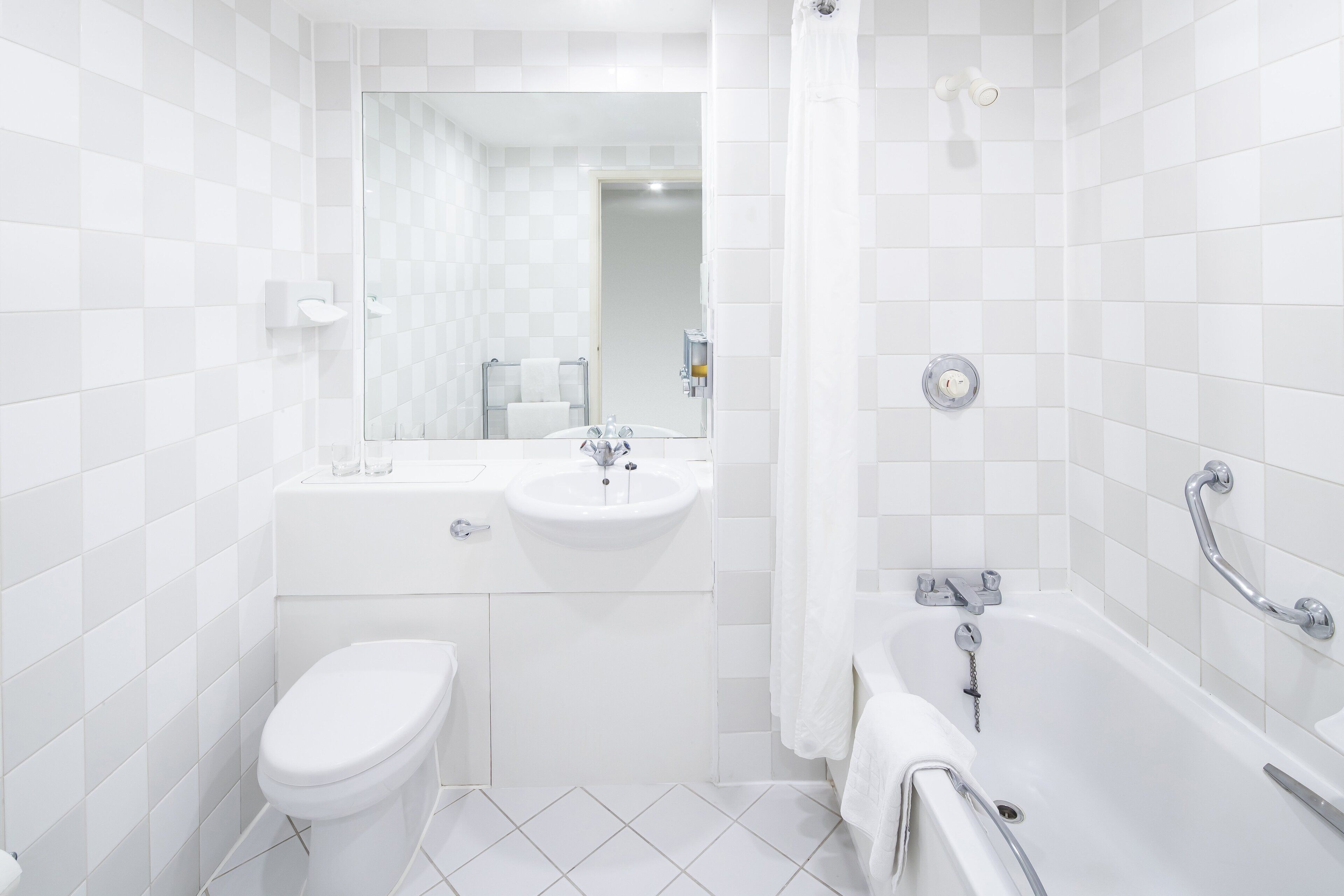 shower, eco-friendly toiletries, hair dryer, towels