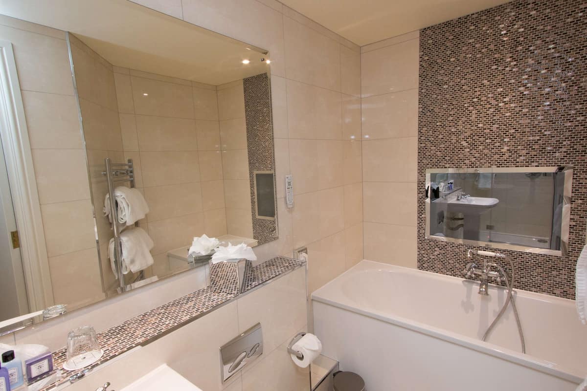 superior suite, 1 double bed | bathroom | free toiletries, hair dryer, slippers, towels