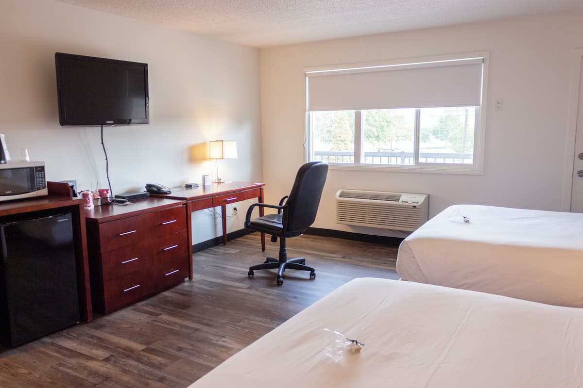 Pillow-top beds, desk, laptop workspace, iron/ironing board