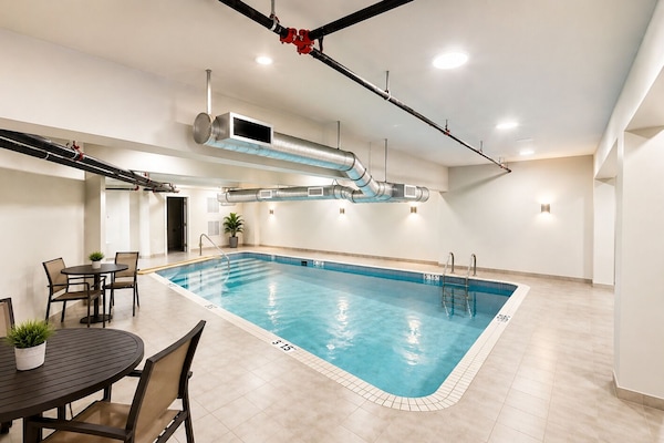 Indoor pool, open 9:00 AM to 9:00 PM, sun loungers