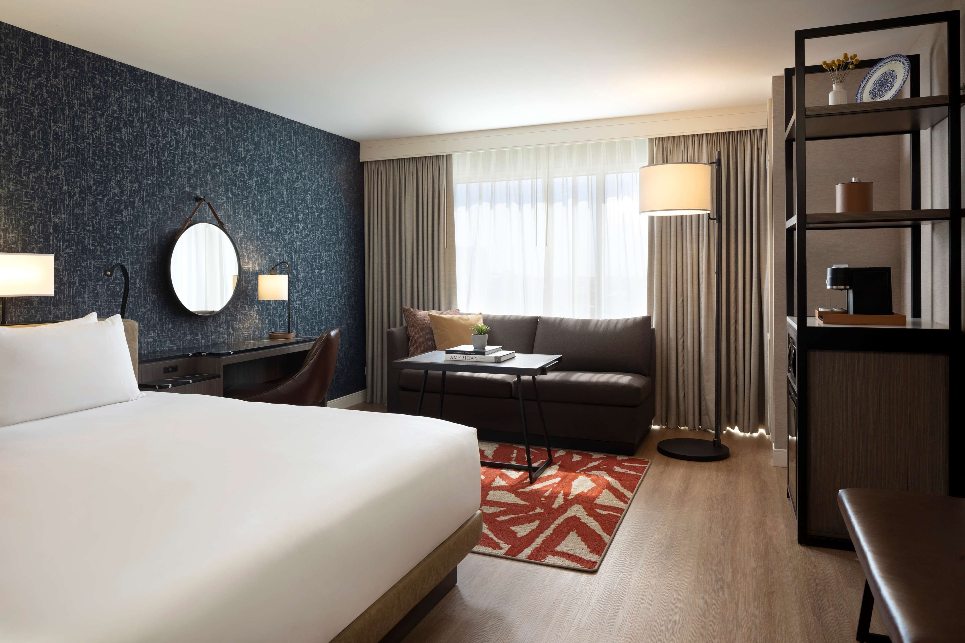 Premium bedding, down comforters, pillowtop beds, in-room safe