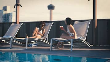 Outdoor pool, open 6:00 AM to 10:00 PM, free cabanas, sun loungers