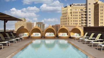 Outdoor pool, open 6:00 AM to 10:00 PM, free cabanas, sun loungers