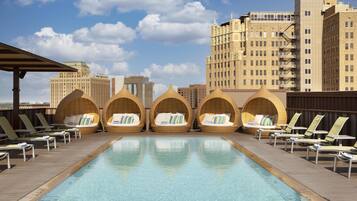 Outdoor pool, open 6:00 AM to 10:00 PM, free cabanas, sun loungers
