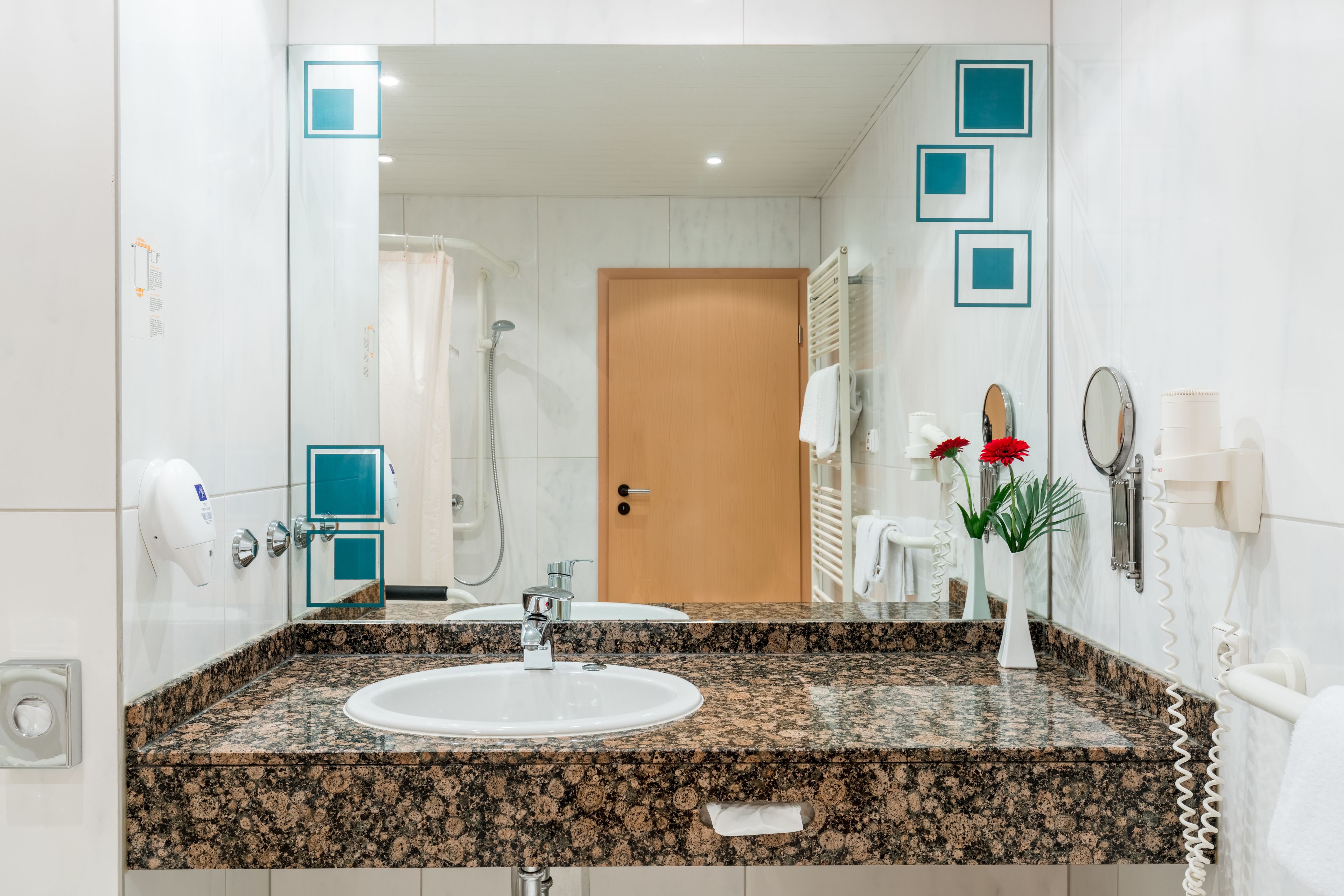 superior single room | bathroom | hair dryer, towels