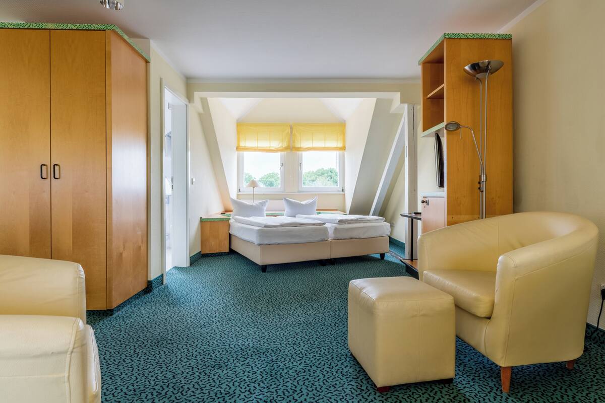 Family Room | Hypo-allergenic bedding available, minibar, in-room safe, desk