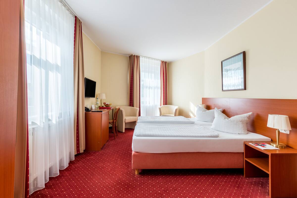 Hypo-allergenic bedding available, minibar, in-room safe, desk