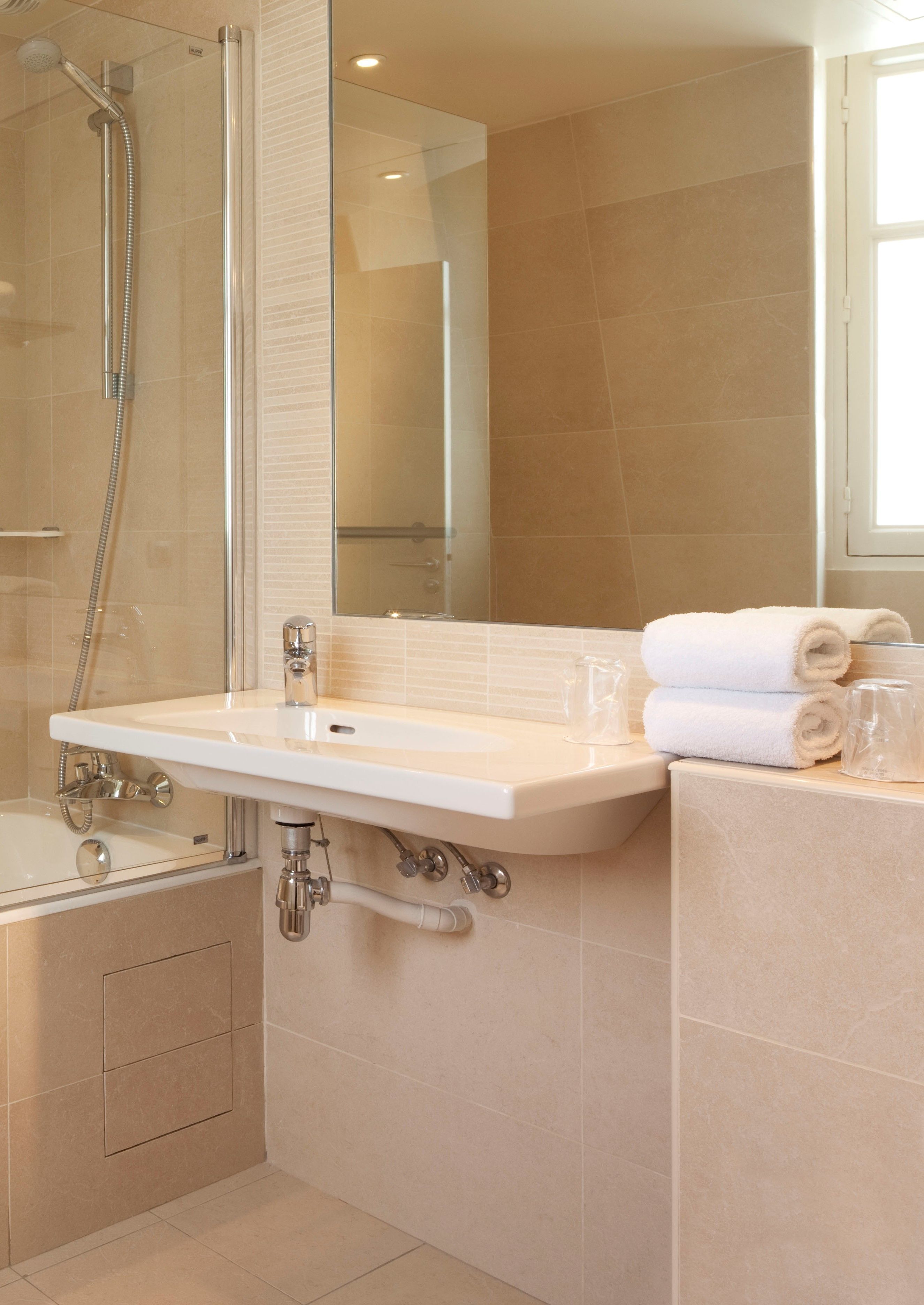 shower, free toiletries, hair dryer, towels