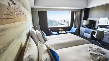 Premium bedding, down duvets, minibar, in-room safe