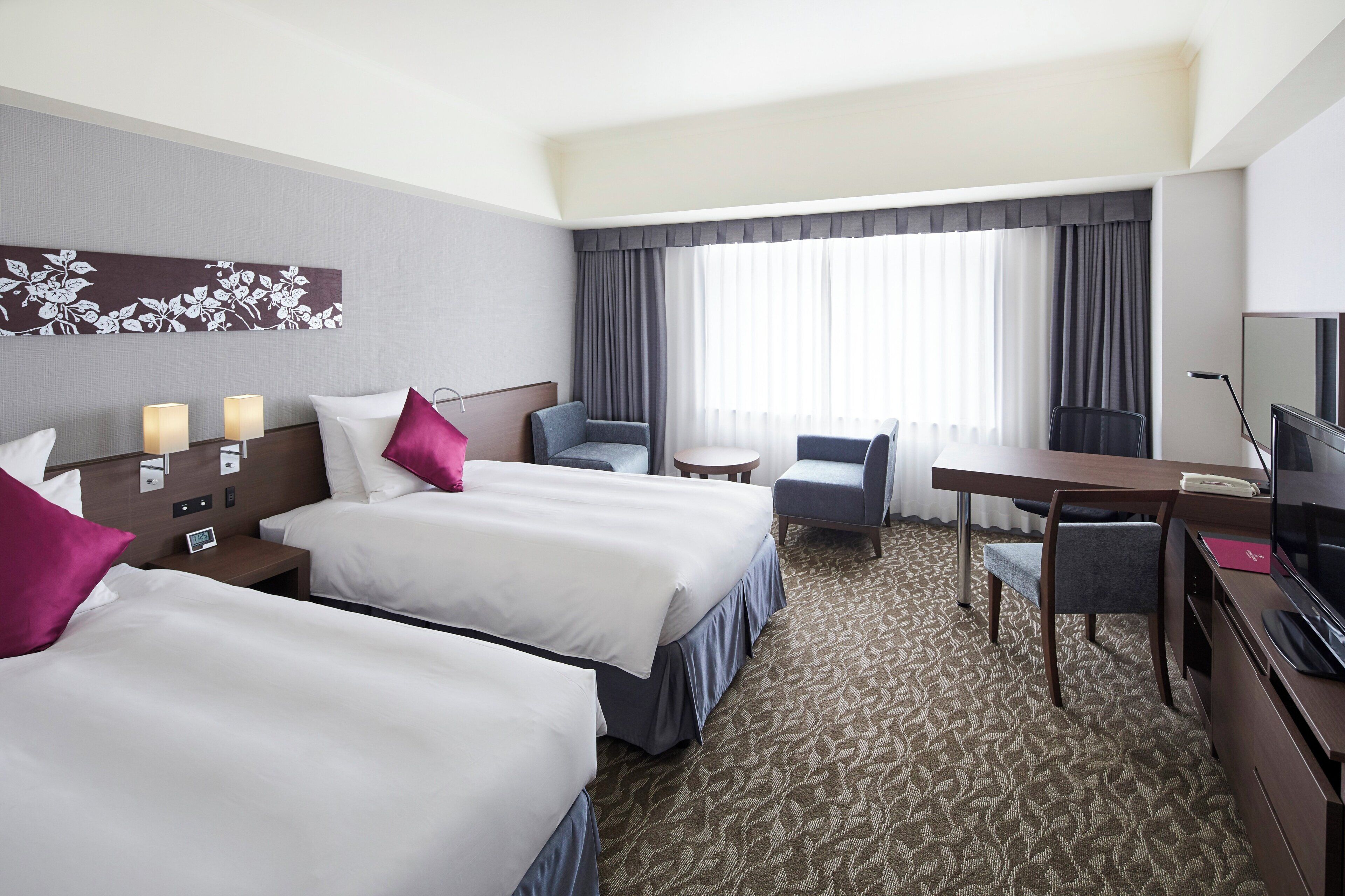 Premium bedding, down comforters, minibar, in-room safe