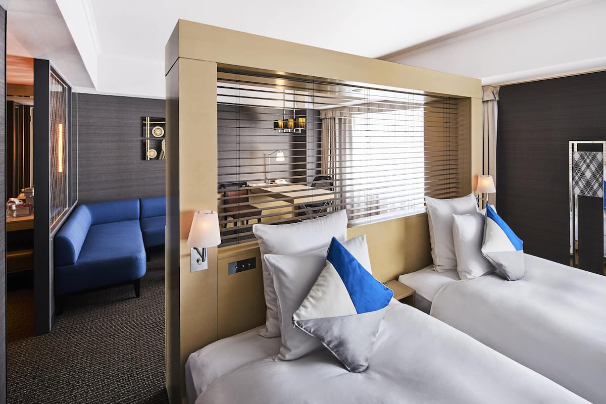 Premium bedding, down comforters, minibar, in-room safe