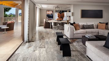 Presidential Suite, 2 Bedrooms | Living area | 55-inch LED TV with cable channels, TV, Netflix