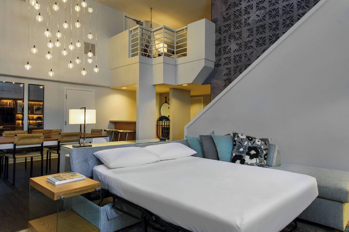 premium bedding, down duvets, pillow-top beds, in-room safe