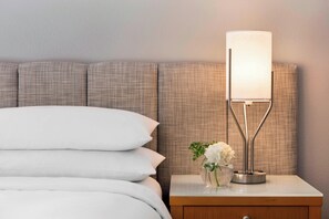 Premium bedding, down comforters, pillowtop beds, in-room safe