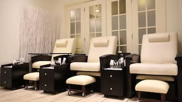 Relax in comfort with four reclining chairs and side tables, perfect for unwinding in style.