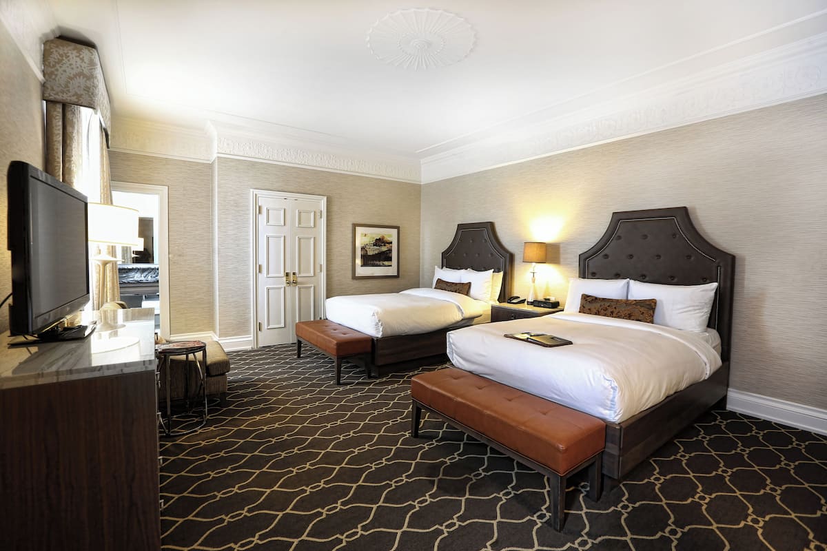 Hypo-allergenic bedding, down comforters, minibar, in-room safe