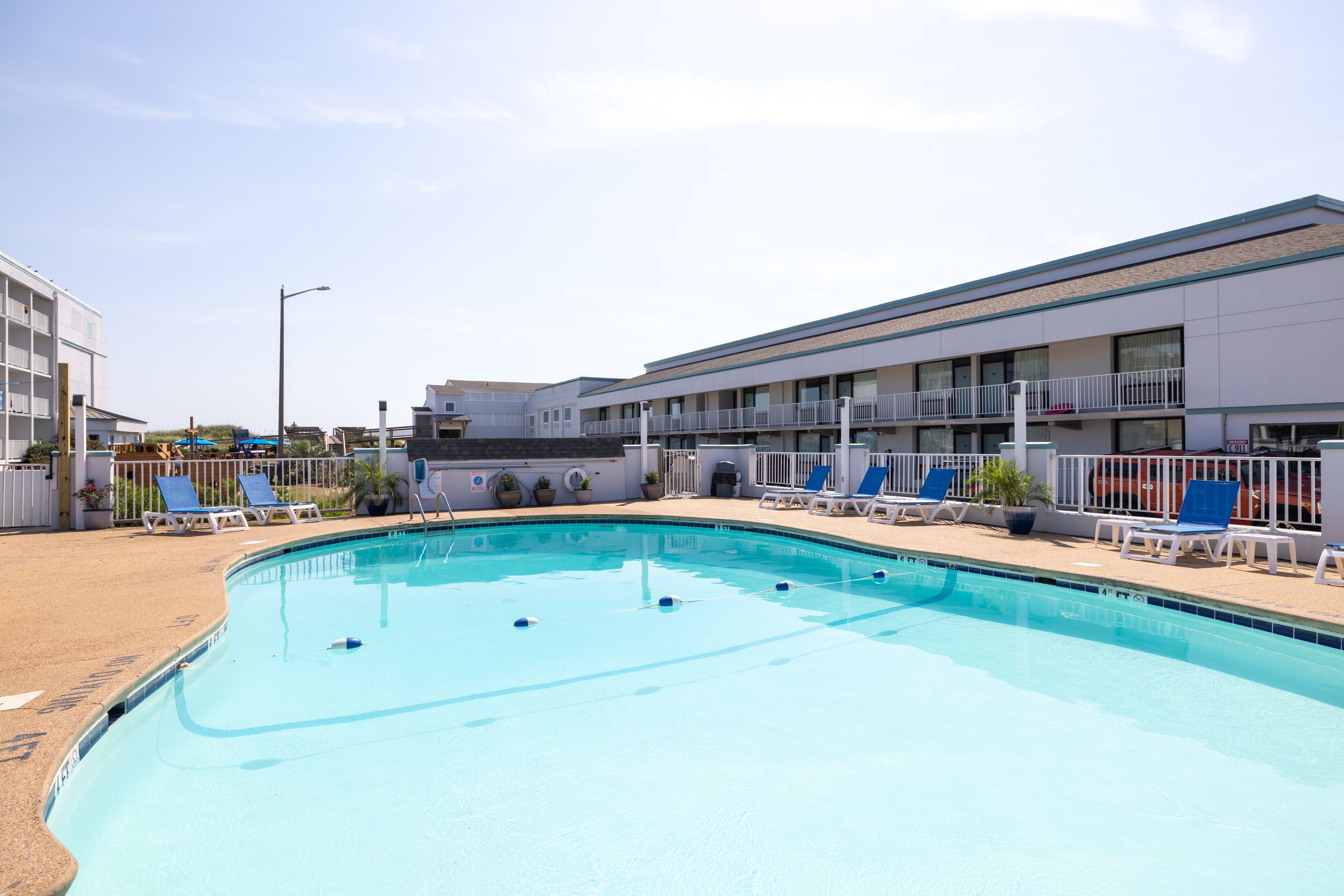outdoor pool, open 10 am to 10 pm, pool loungers