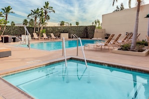 Outdoor pool, open 9:00 AM to 9:00 PM, sun loungers