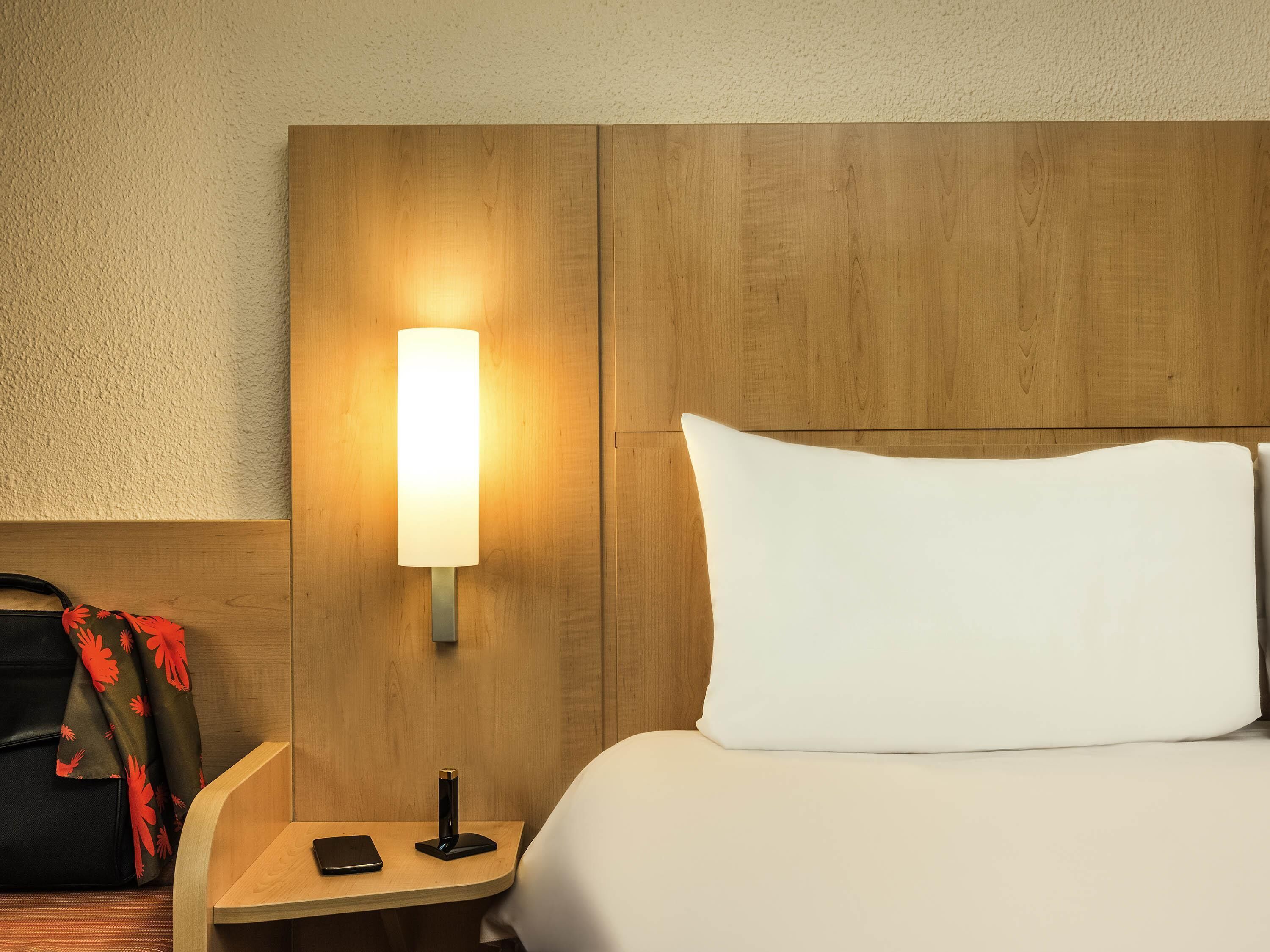 Pillowtop beds, individually furnished, blackout drapes, free WiFi