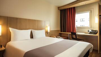 Standard Room, 1 Double Bed | Pillowtop beds, individually furnished, blackout drapes, free WiFi