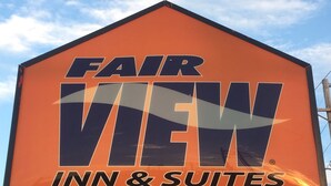 A sign for Fair View Inn & Suites.