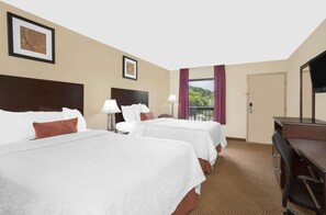 Premium bedding, blackout drapes, iron/ironing board