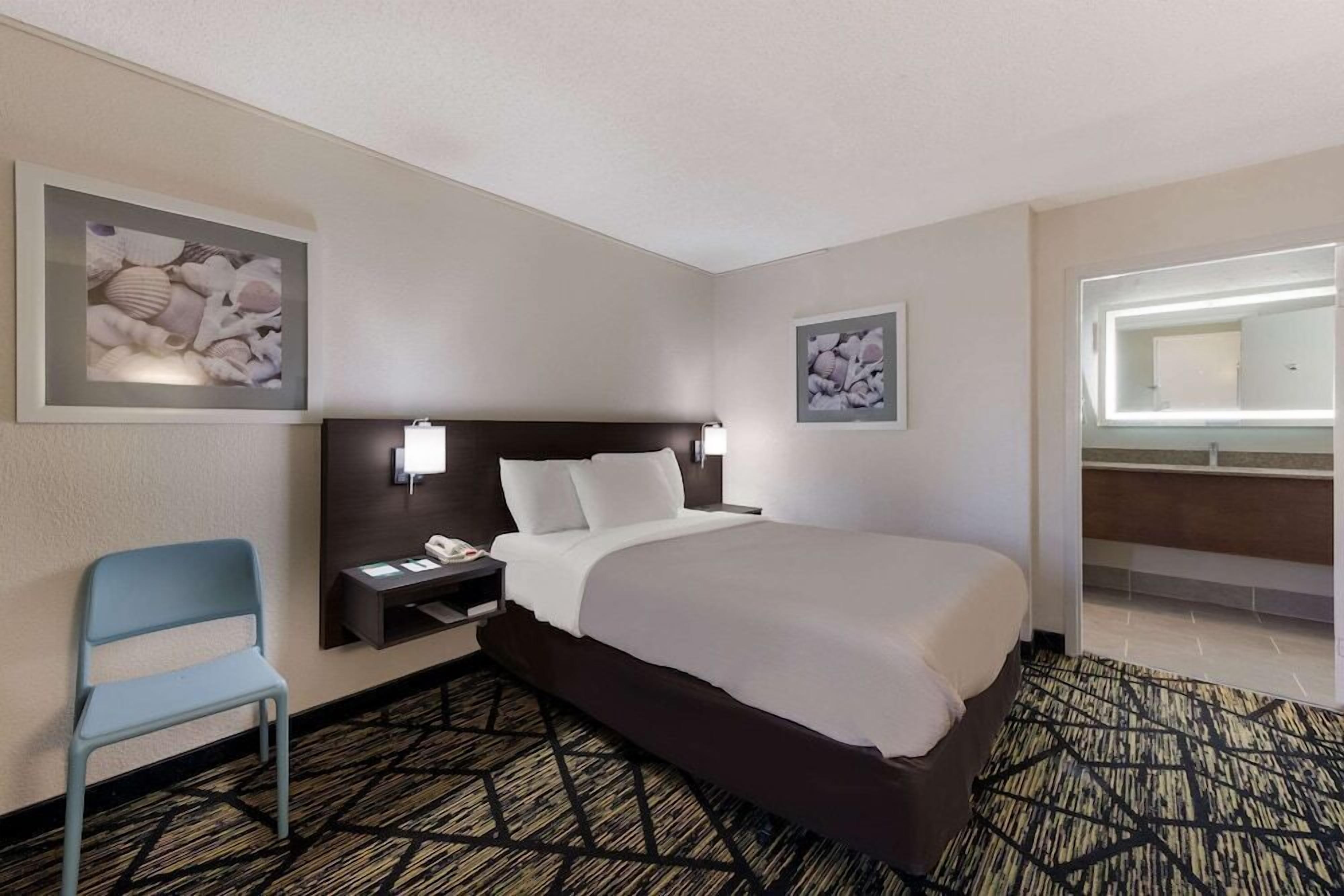1 bedroom, premium bedding, laptop workspace, iron/ironing board