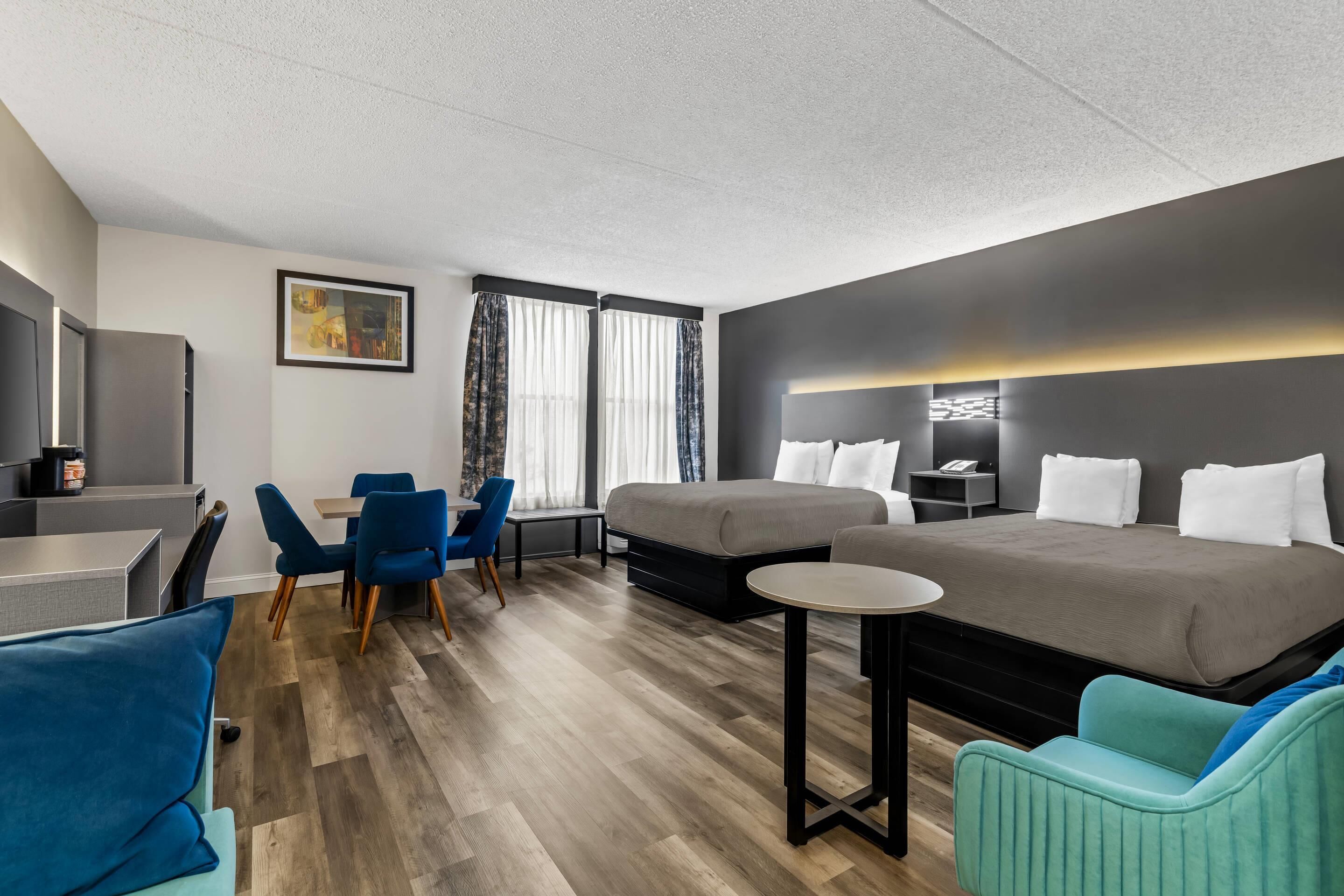 Desk, laptop workspace, blackout curtains, iron/ironing board