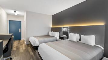 Desk, laptop workspace, blackout drapes, iron/ironing board