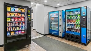 Three vending machines in a hallway, one with snacks and the other with beverages. - Quality Inn Bangor Airport (Bangor)