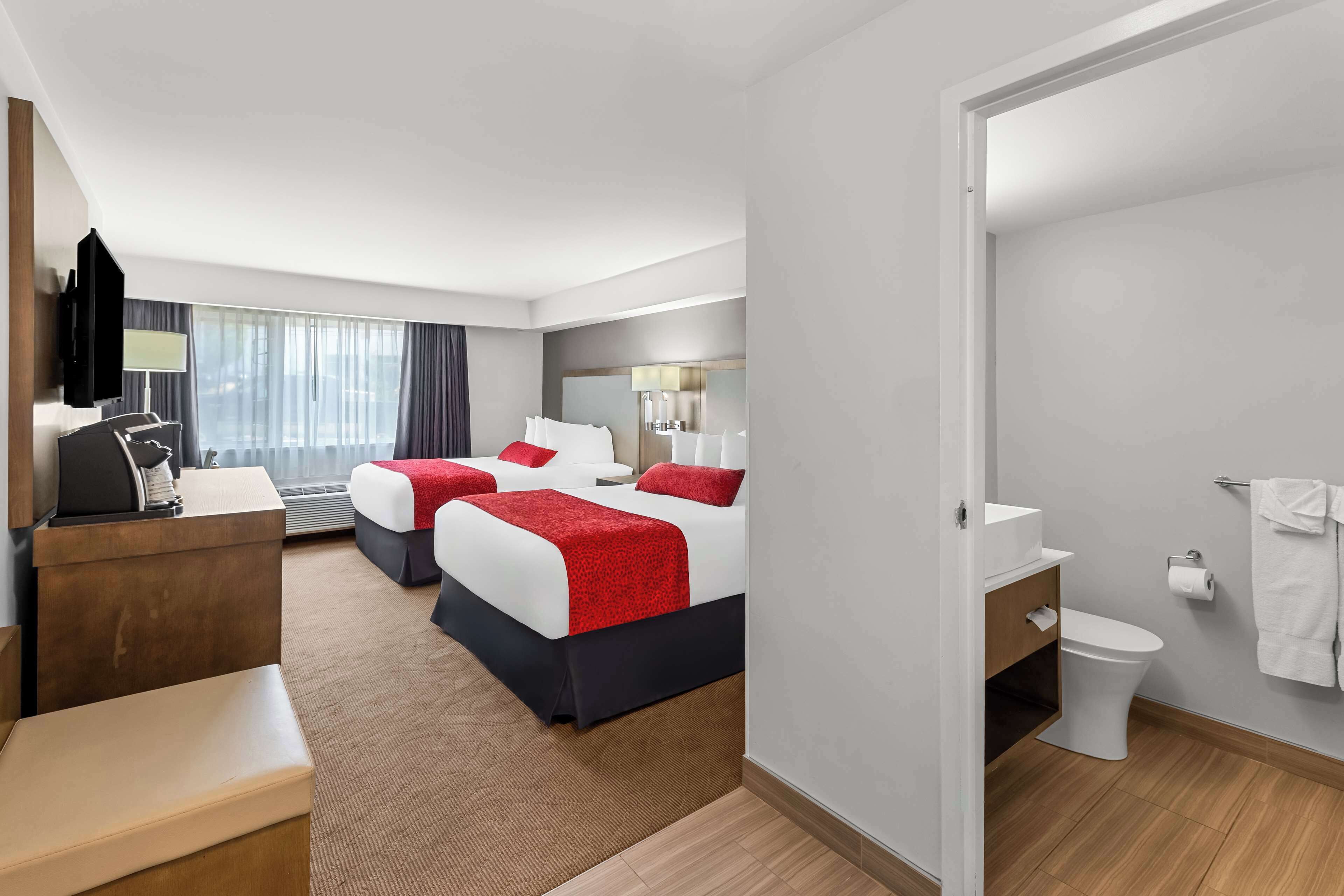 laptop workspace, blackout curtains, soundproofing, iron/ironing board