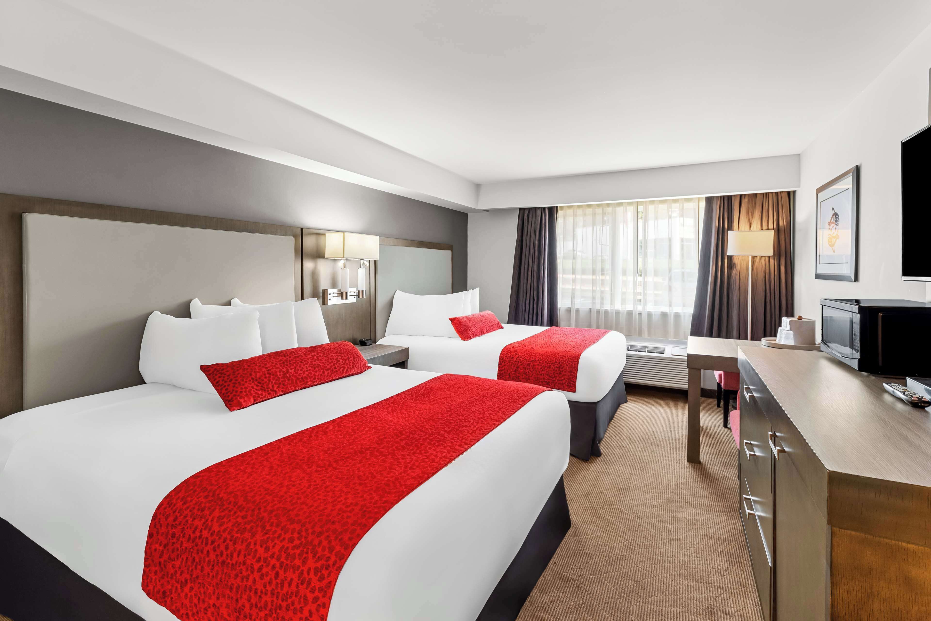 Standard Room, 2 Queen Beds, Non Smoking | Laptop workspace, blackout curtains, soundproofing, iron/ironing board