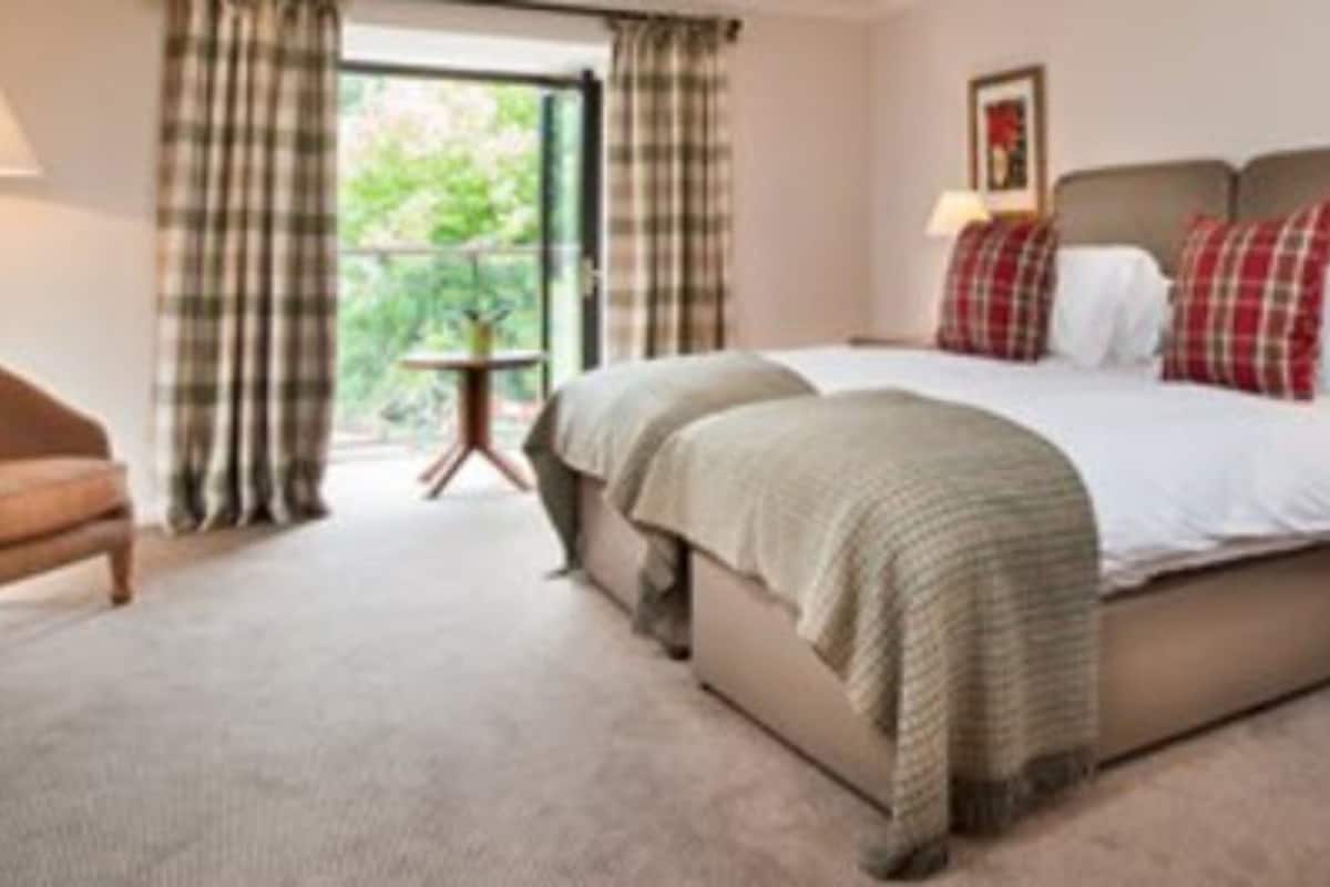garden suite | in-room safe, desk, iron/ironing board, free wifi