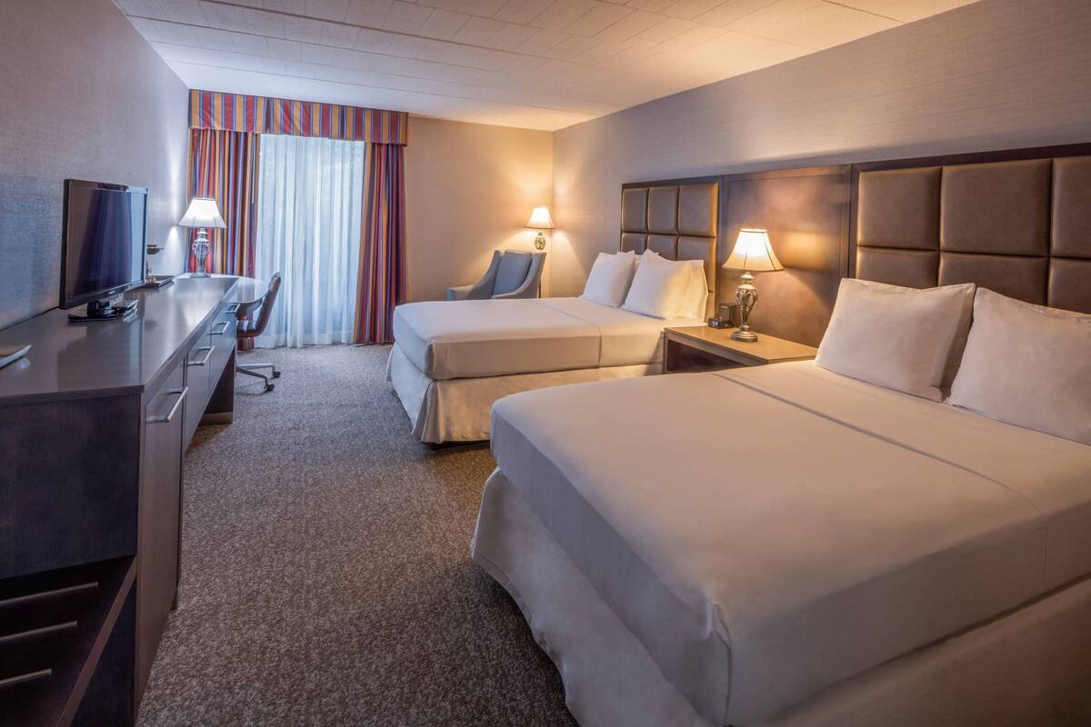 Desk, laptop workspace, blackout drapes, iron/ironing board