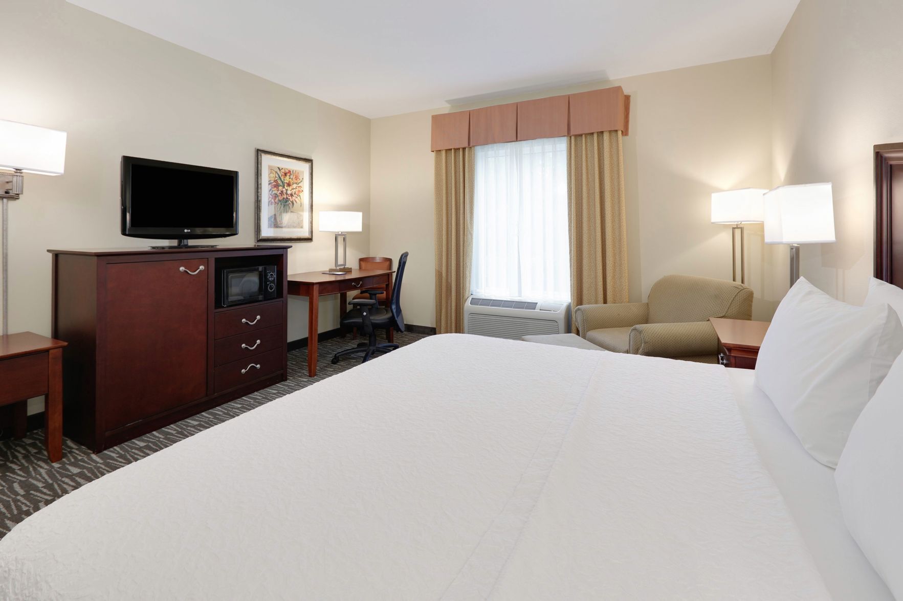 Premium bedding, pillowtop beds, in-room safe, blackout drapes