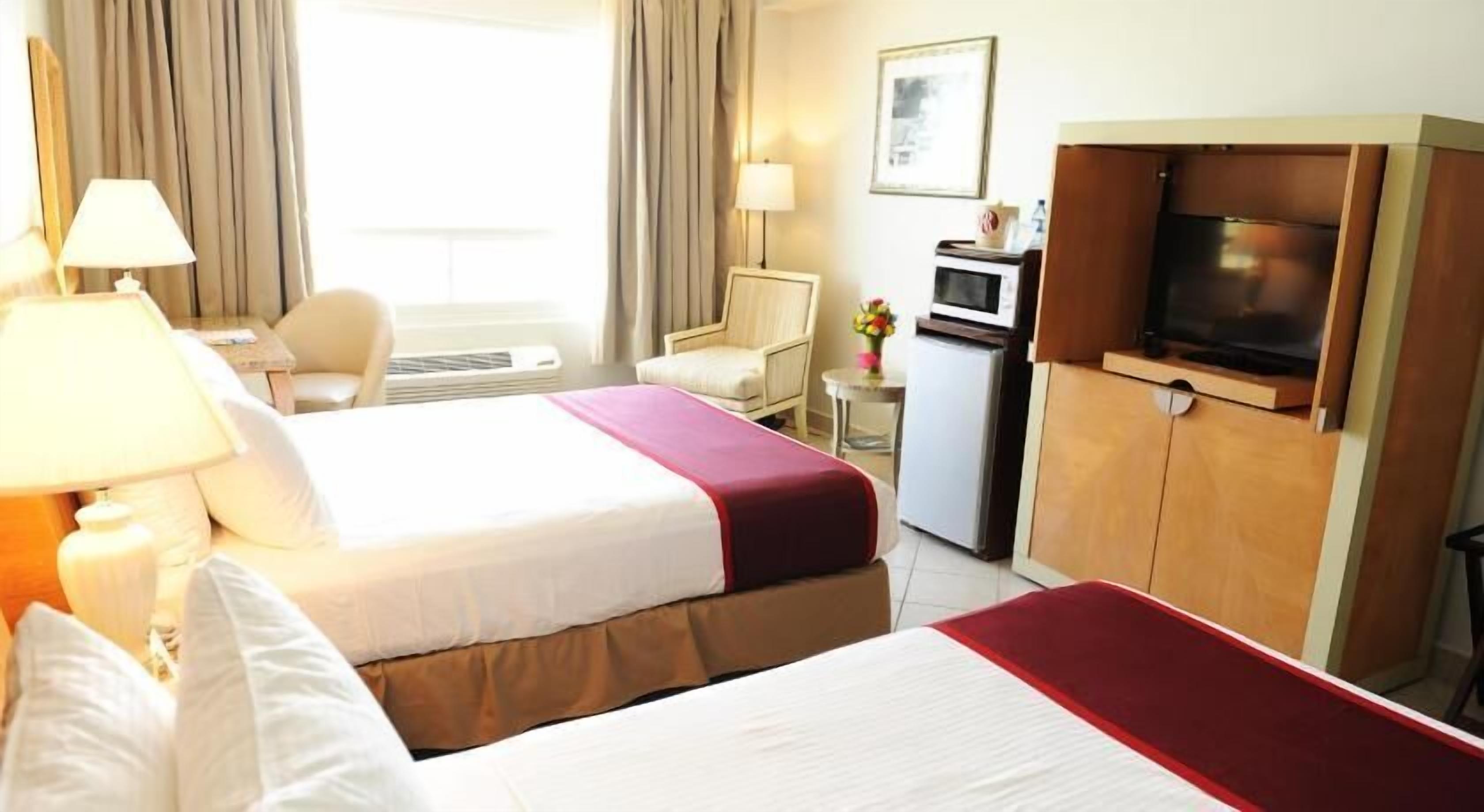 In-room safe, desk, iron/ironing board, free cribs/infant beds