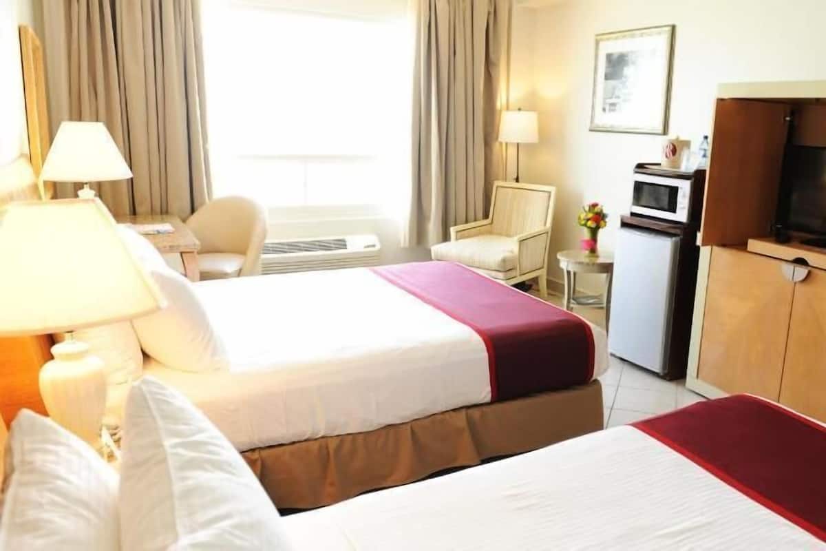 In-room safe, desk, iron/ironing board, free cribs/infant beds