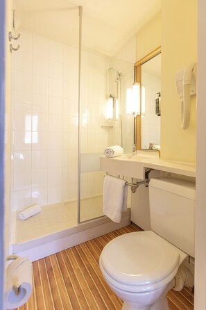 Shower, eco-friendly toiletries, hair dryer, towels