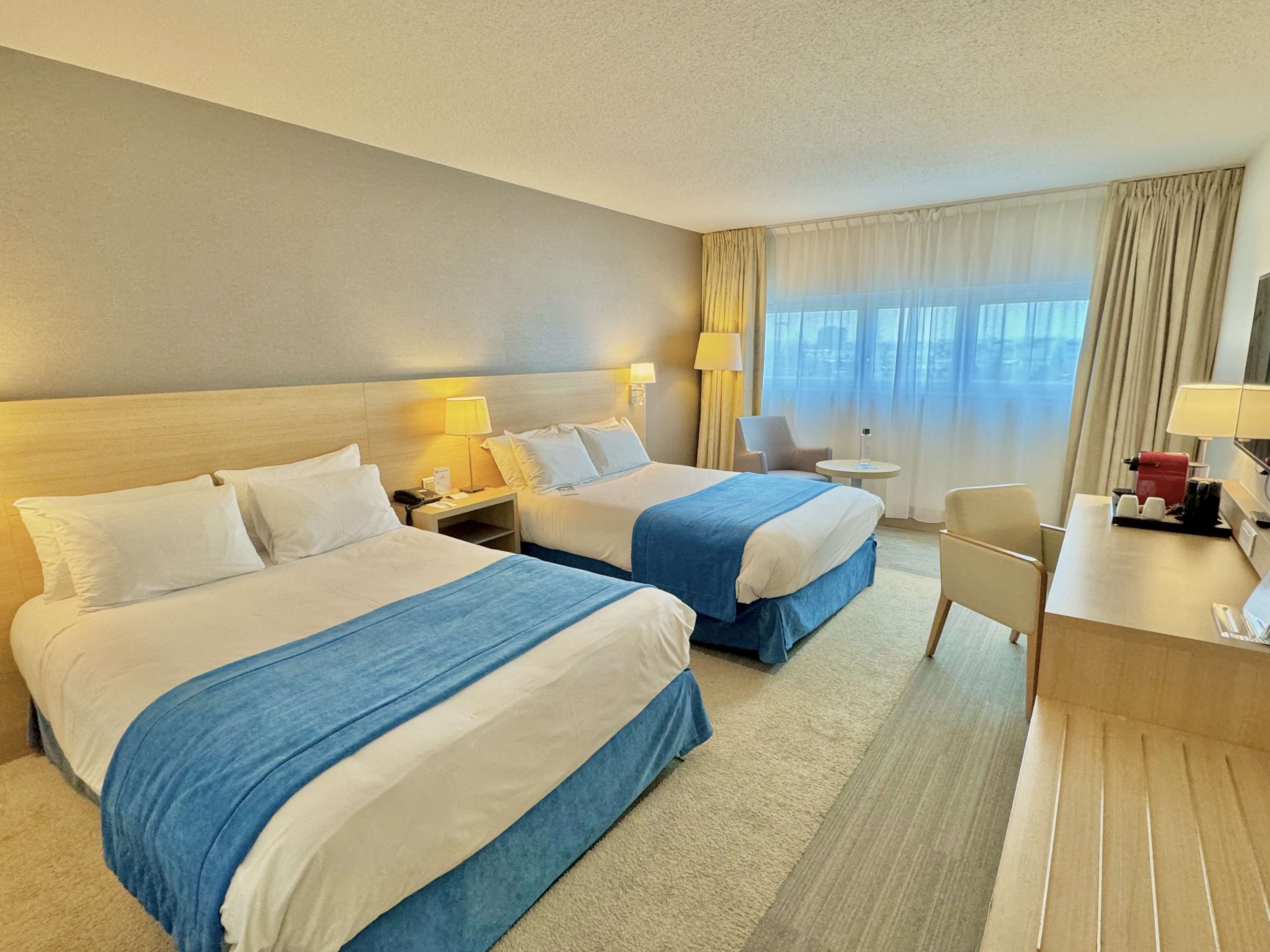 superior room, 1 queen bed, refrigerator | premium bedding, in-room safe, desk, blackout curtains