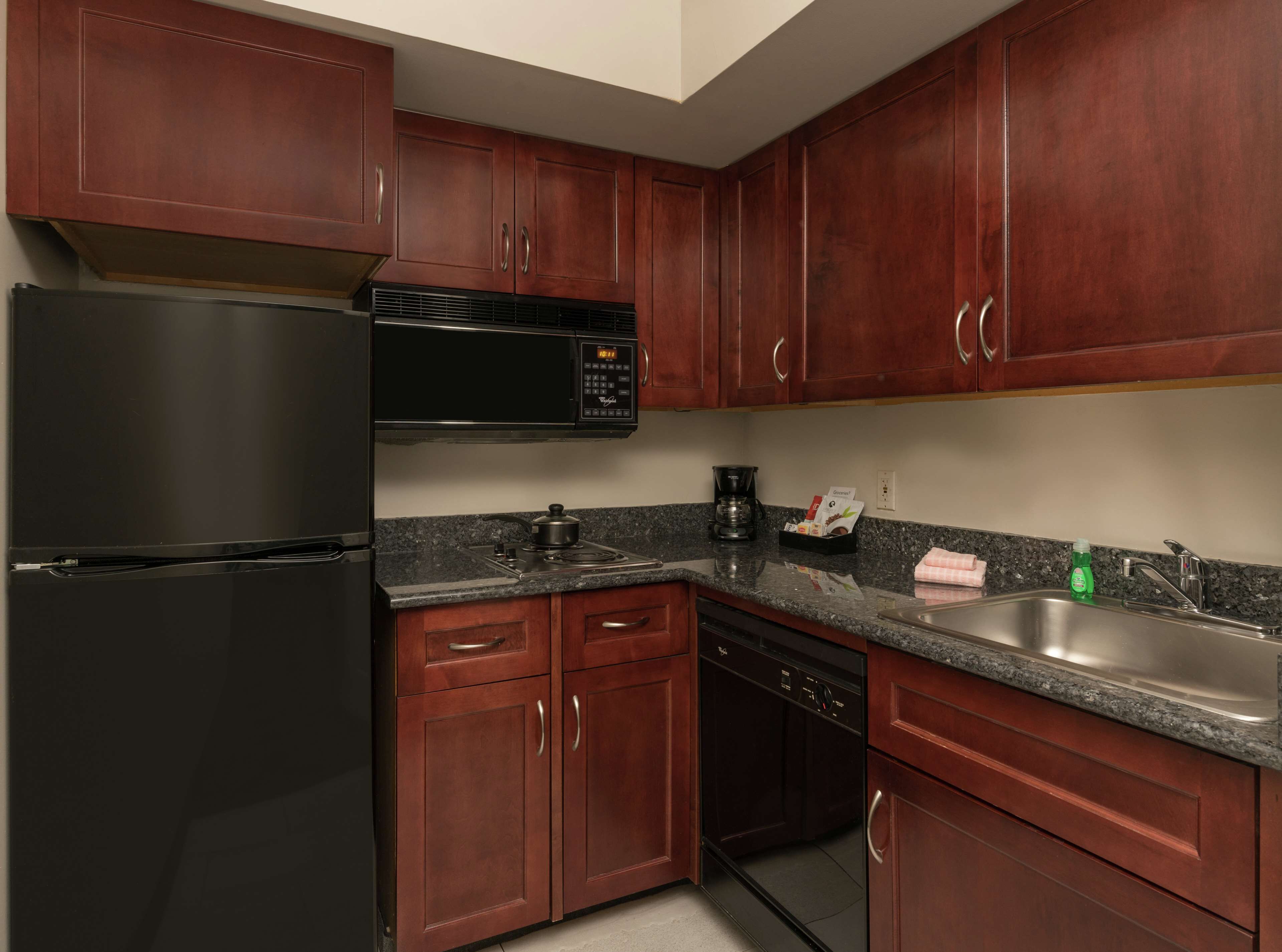one king bed, non-smoking, with fireplace | private kitchen | full-sized fridge, microwave, stovetop, dishwasher