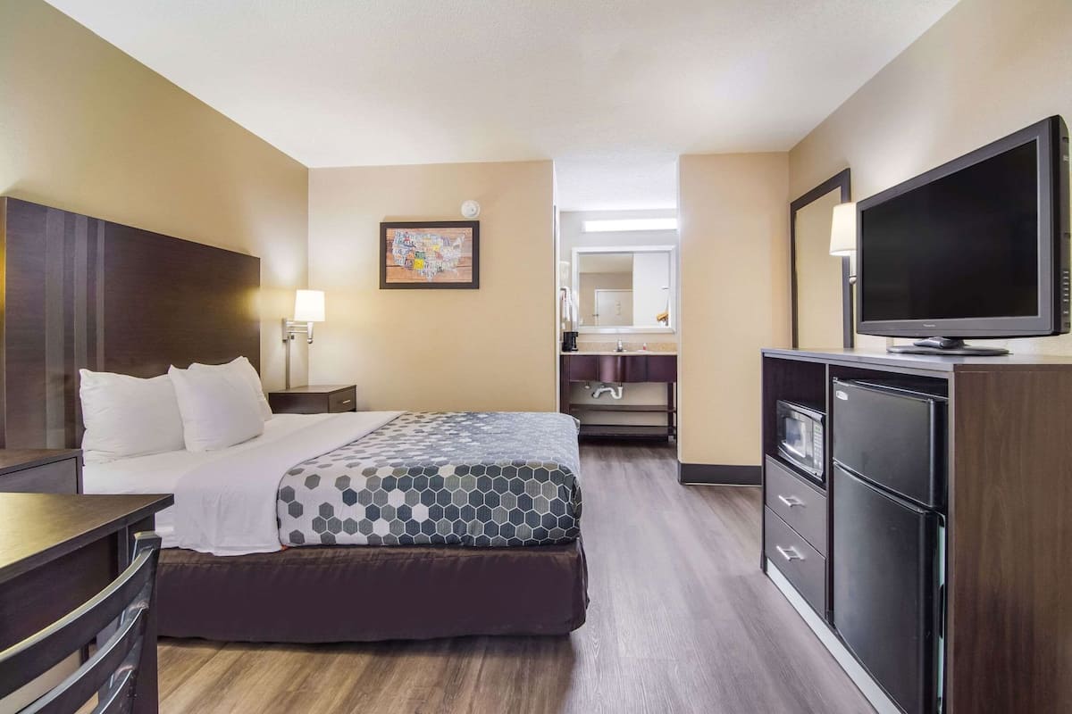 Desk, blackout drapes, iron/ironing board, rollaway beds