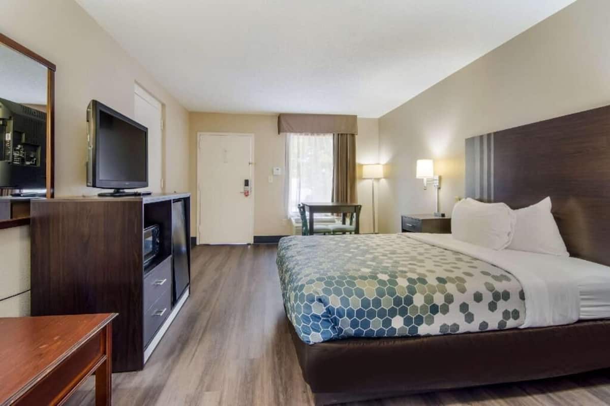 Desk, blackout drapes, iron/ironing board, rollaway beds