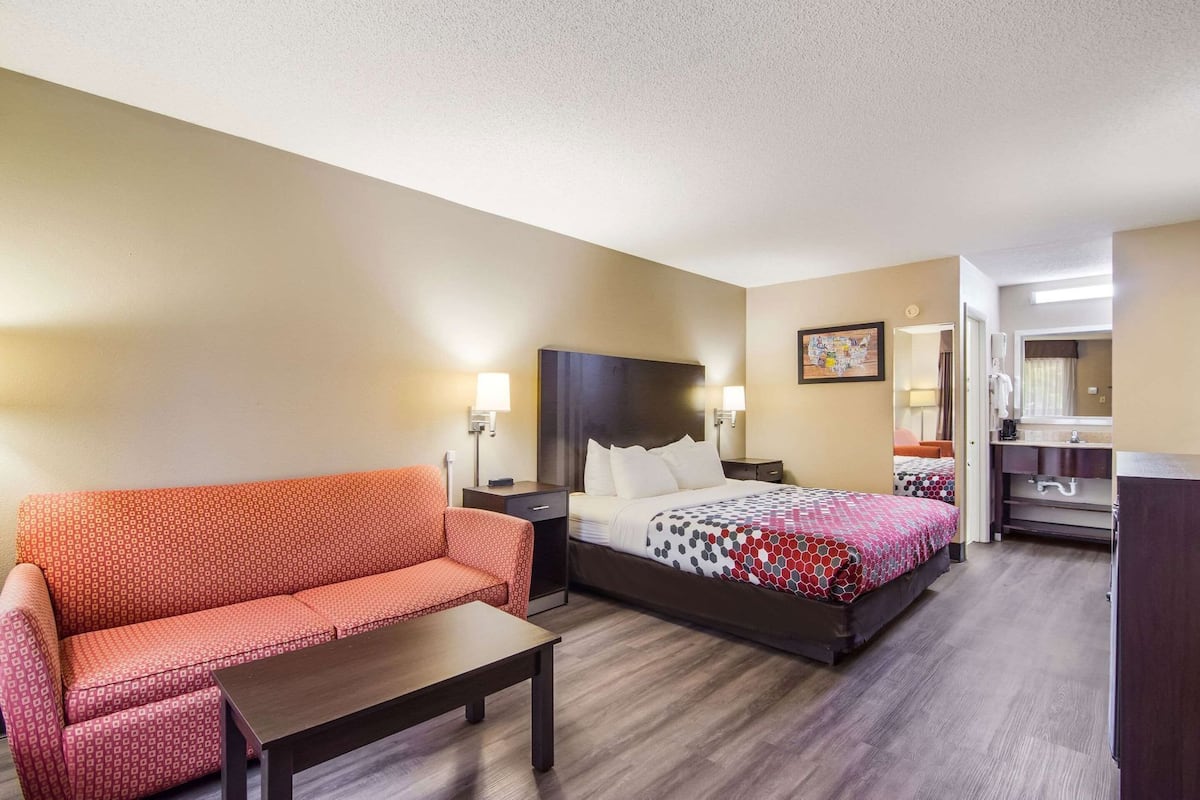 Desk, blackout drapes, iron/ironing board, rollaway beds