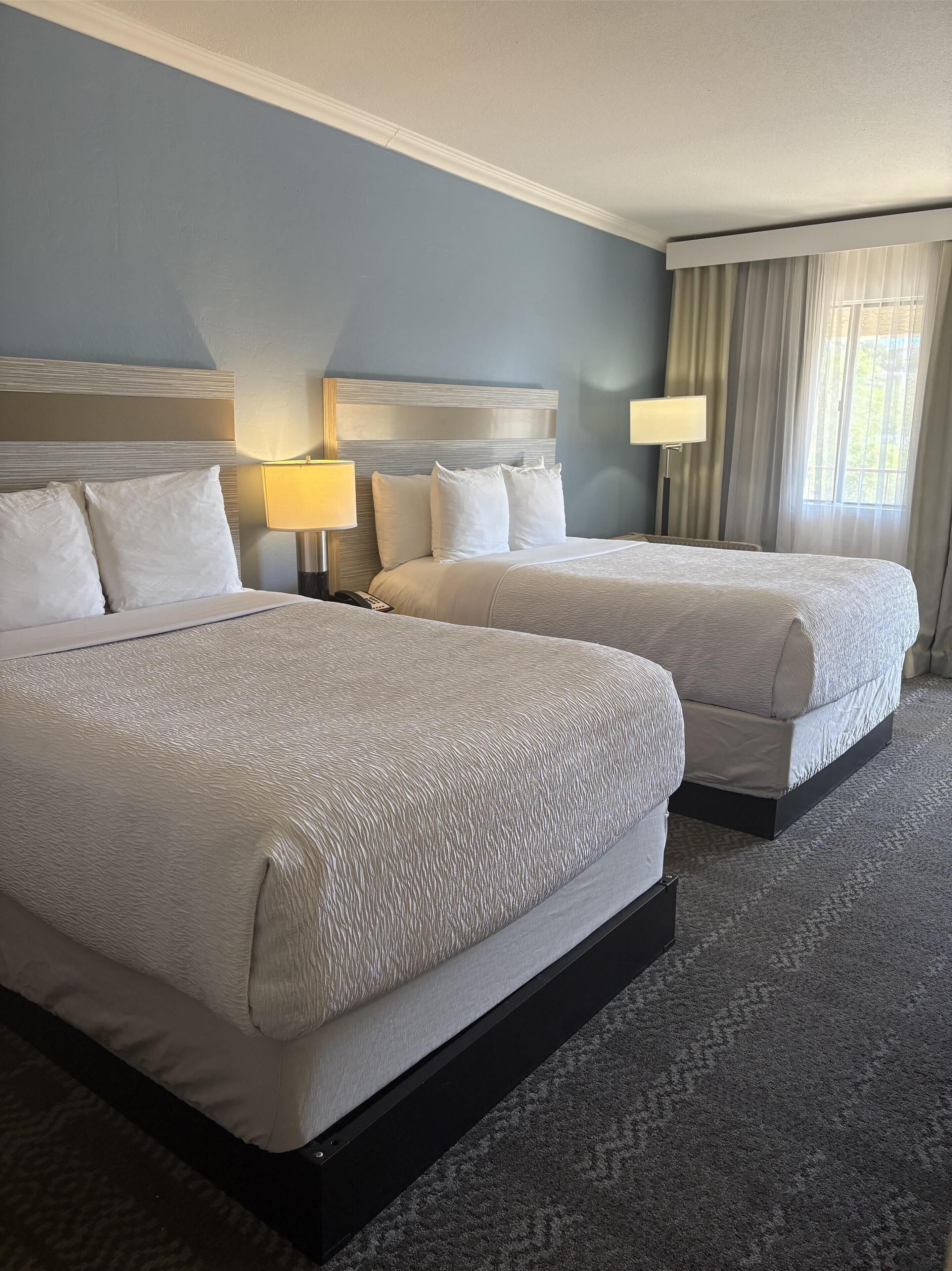 Pillowtop beds, in-room safe, blackout drapes, iron/ironing board