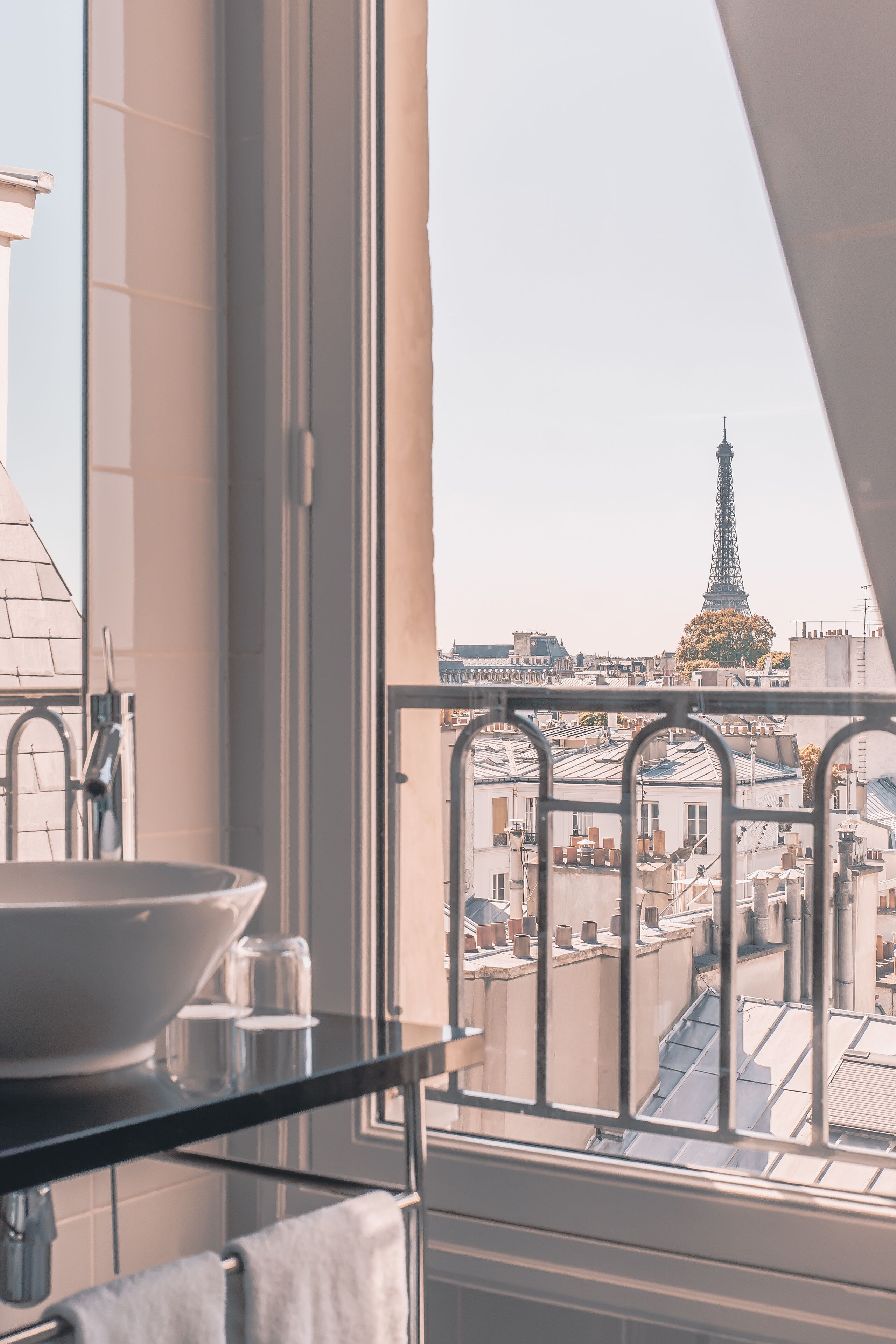 spacious eiffel tower view | bathroom | combined shower/bathtub, free toiletries, hair dryer, towels