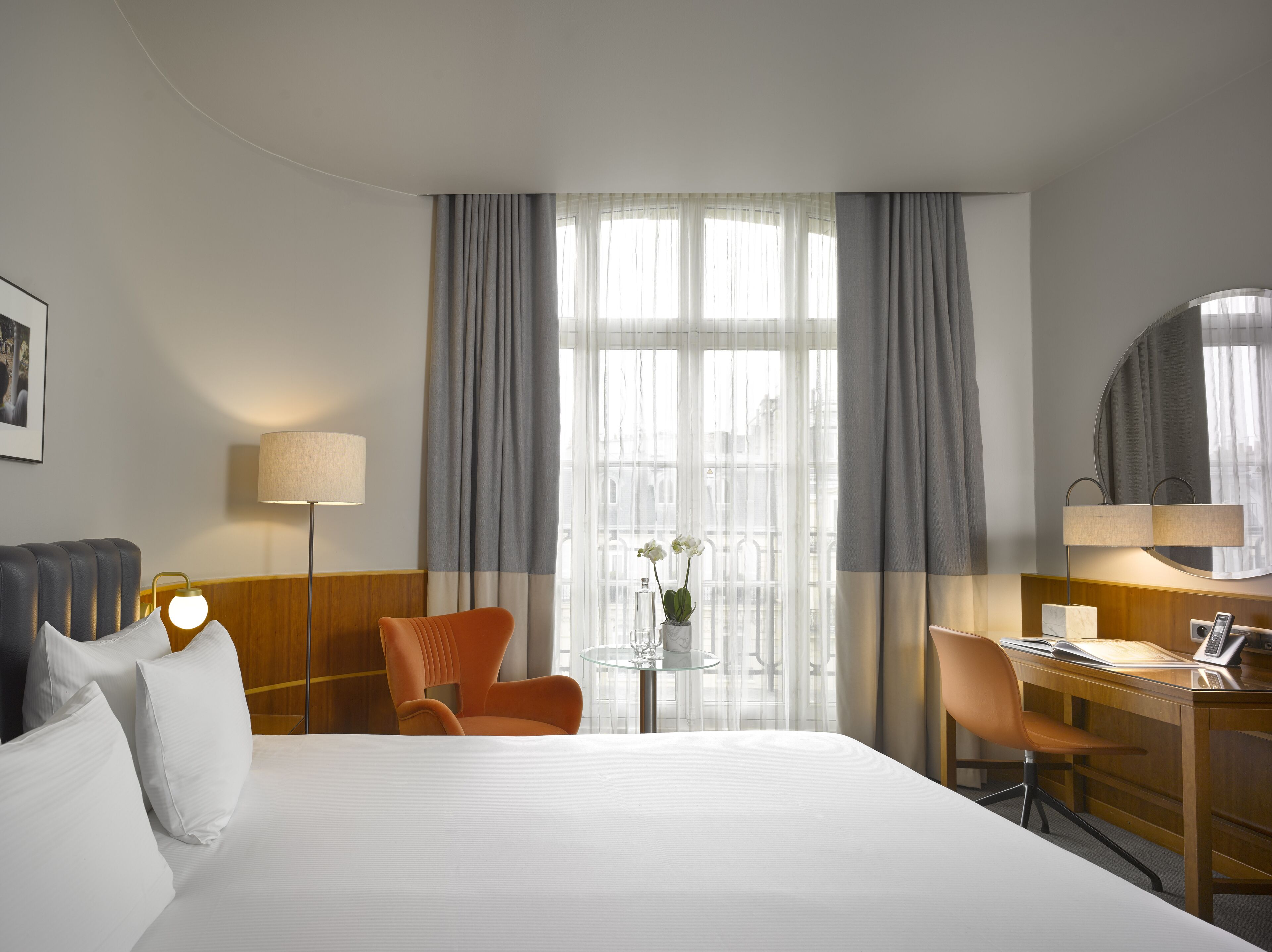 cozy city view | premium bedding, minibar, in-room safe, soundproofing